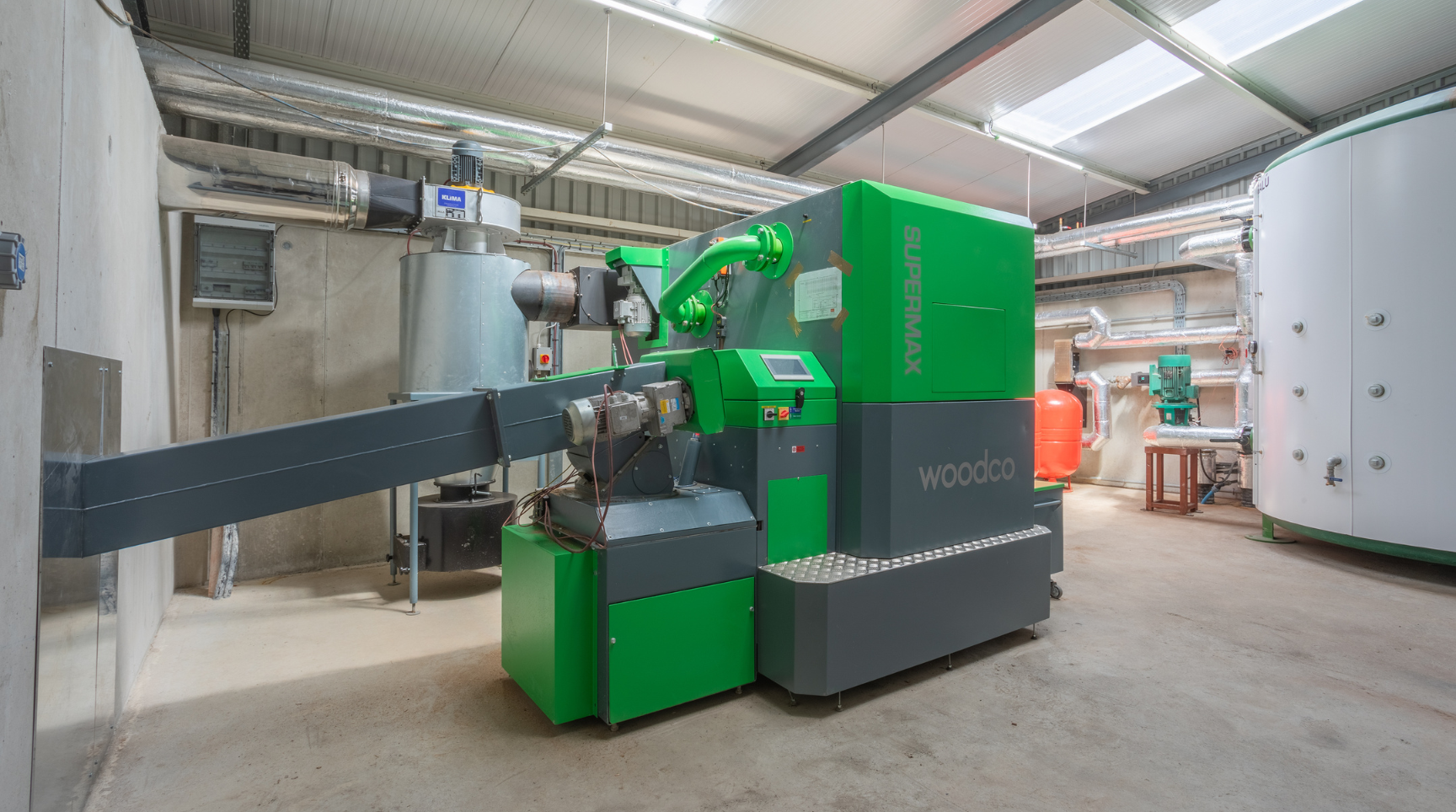 commercial biomass boiler in a clean plant room