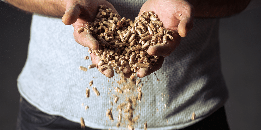 Close-up of wood pellets, a compact and renewable biomass fuel commonly used in heating systems for sustainable energy production