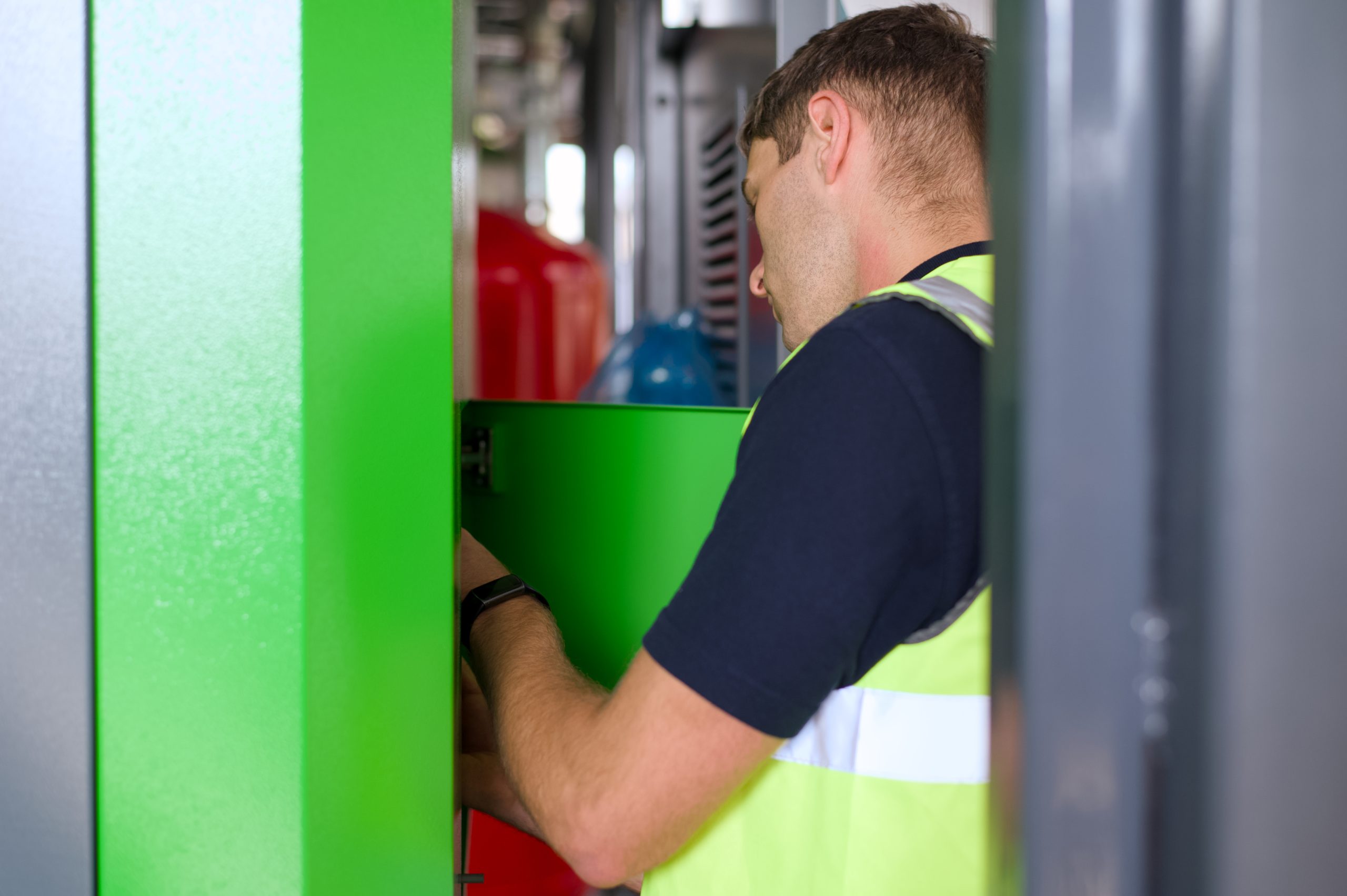 a woodco biomass service engineer conducting a yearly inspection